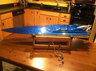 LARGE REMOTE CONTROLLED FIBERGLASS GAS POWERED BOAT, OVER 4 FEET LONG