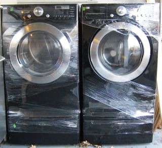 Matching Black LG Tromm Washer Dryer Set w Pedestals