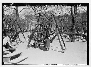 in playground swings,Hamilto n Fish Park,New York,NY,swings et,wooden