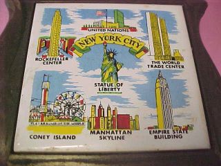 B33 Vintage New York City Cast iron tile trivet hotplate Cherry Made