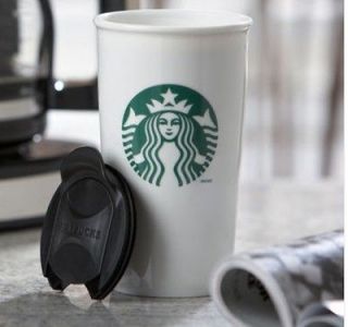 2012. white ceramic travel coffee mug with locking lid 12oz