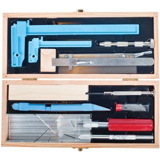 Deluxe Dollhouse Tool Set (VariousMaterials: Metal, plasticIncluded in the set are one K1 light duty knife; one K5 heavy duty knife; one pinvise; one mitre box; one B490 saw blade; one sanding block and wedge; one awl; one sanding stick; one regular screw