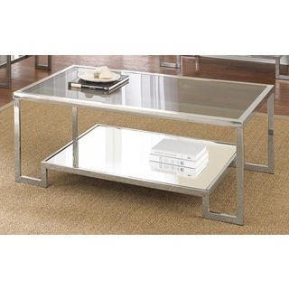 Cordele Chrome And Glass Coffee Table (Chrome, tempered glassQuantity: One (1) coffee tableShiny chrome finished frame with 5mm tempered smoked glass insertsContemporary designRaised, base perfect for displaying decorative itemsFloor glides to help protec
